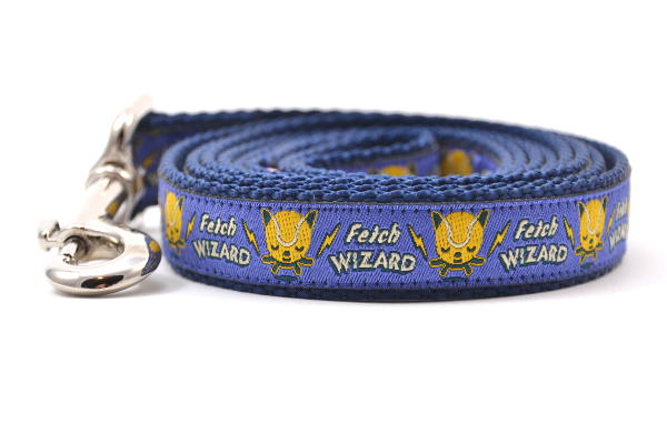 Small light purple dog leash - with words Fetch Wizard - and tennis ball icon with lightening bolts.