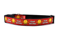 Large red dog collar with the words Fetch Wizard and a tennis ball icon with lightening bolts.