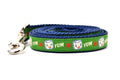 Small Green dog leash with Marshall the Marshmallow.  Marshall is shown smiling and giggling. The design also includes the word YUM.