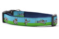 Large Dog collar that is half blue and half green with a dog dressed in a Ninja Suit.  The dog is shown in various tai chi positions.