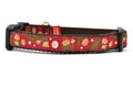 Small burgundy dog collar with chamomile flowers, stars, and half moon design.