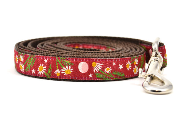 Small burgundy dog leash with chamomile flowers, stars, and half moon design.