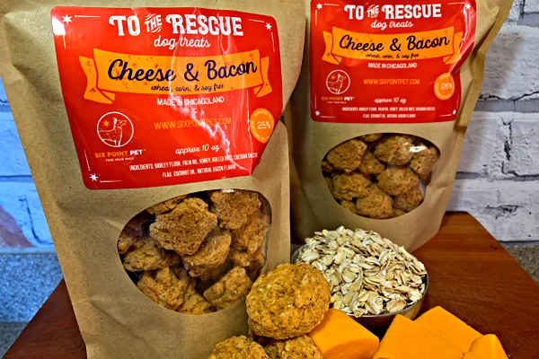 Two bags of Cheese and Bacon treats pictured with cheese and oatmeal.