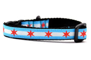 XXS dog collar with two light blue stripes and one white stripe and red six pointed stars - representing the Chicago Flag.