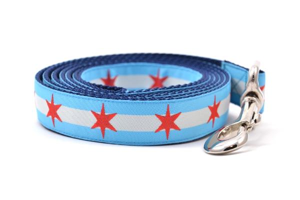 Large dog leash with two light blue stripes and one white stripe and red six pointed stars - representing the Chicago Flag.