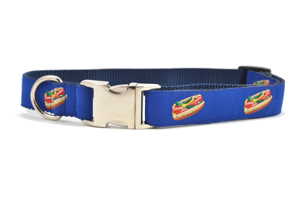 Large navy dog collar with metal clasp with design that depicts the Chicago Style Hot Dog.
