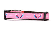 Picture of small pink dog collar with angel wings and words earth angel.