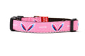 Picture of XS pink dog collar with angel wings and words earth angel.