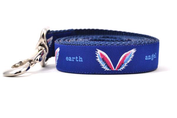 Picture shows navy dog leash with images of angel wings and words earth angel.