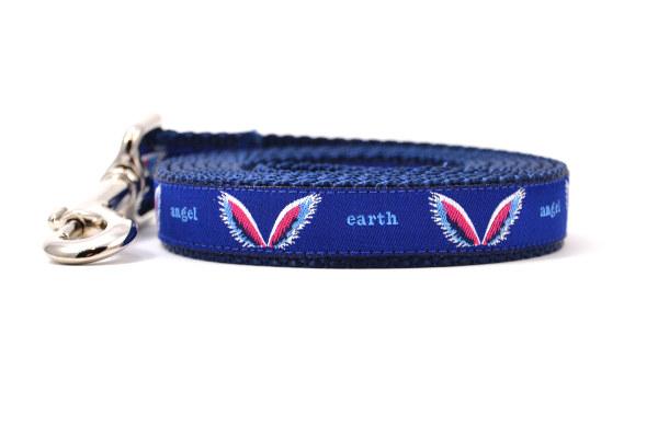 Picture shows navy dog leash with images of angel wings and words earth angel.