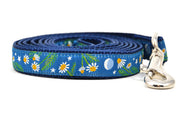 Small dark teal dog leash with chamomile flowers, stars, and half moon design.