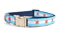Large dog collar with metal clasp - dog collar has two light blue stripes and one white stripe and red six pointed stars - representing the Chicago Flag.