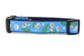 Medium light blue dog collar with chamomile flowers, stars, and half moon design.