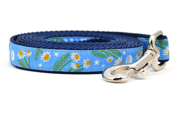 Small light blue dog leash with chamomile flowers, stars, and half moon design.
