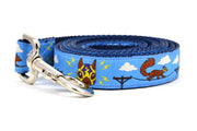 One large light blue dog leash - design includes squirrels running on telephone wires and squirrel in lucha libre mask.  The mask is purple and yellow with electrical sparks coming from the mask.