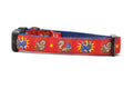 XS red dog collar - design includes squirrel in lucha libre mask with a yellow flower behind it and a tulip on the mask.  One small squirrel with a tulip in its mough and one with a tulip bulb.  Also, a six pointed star.