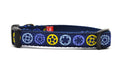 XS navy dog collar with light blue, yellow, and purple bicycle sprockets.