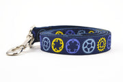 Large navy dog leash with yellow, light blue, and purple bicycle sprockets.