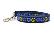 Small navy dog leash with yellow, light blue, and purple bicycle sprockets