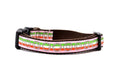 Small pink dog collar with light green, white, and red stripe and bicycyle sprockets in gray.