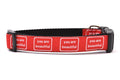 Medium dog collar that is red with the words you are beautiful in white. 
