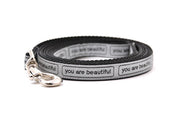  XS Dog leash that is silver with the words you are beautiful in black.